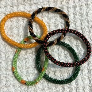 5 Sashka Co beaded braceletsded braceets.  Fall/Halloween/Pumpkin. Approx 8”.